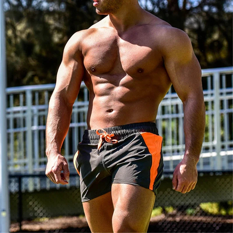 Muscleguys Summer Beach Shorts Mens Fitness Bodybuilding Breathable Quick Drying Sweat Shorts Gyms Casual Joggers Short Pants