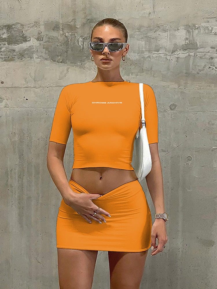 Hugcitar Letter Print Solid Turtleneck Short Sleeves Crop Top Skirts 2 Pcs Set Sexy Slim Summer Fashion Outfit Streetwear Sports